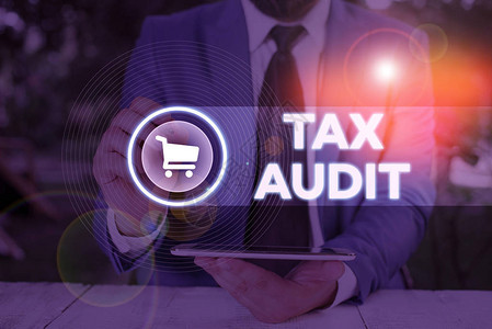 文字书写文本税务审计展示审查或核实企业或个人纳税申报背景图片