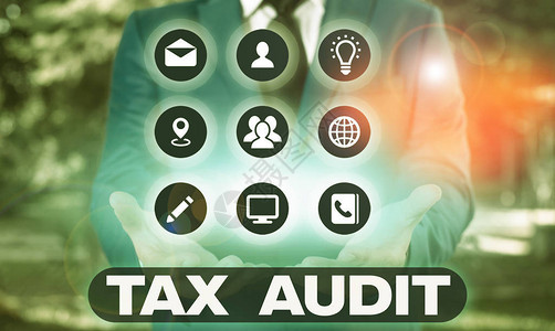 书写文本税务审计展示审查或核实企业或个人纳税申报背景图片