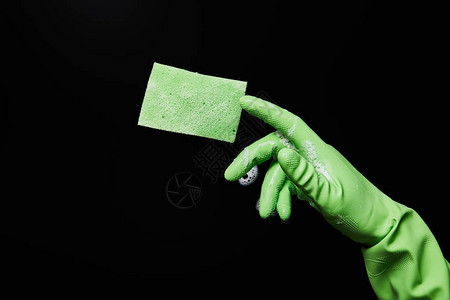 绿色橡胶手套和黑底海绵的绿色橡胶手套中图片