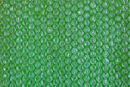 玻璃纸和塑料背景旧塑料用球包装的质感图像绿图片