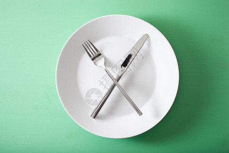 断续的禁食和饮食体重减少叉子和刀插图片