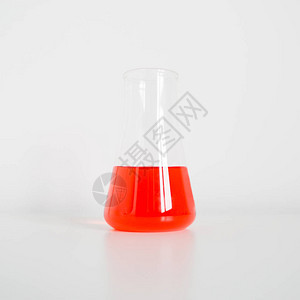 实验室设备白桌上装有彩色液体的实图片