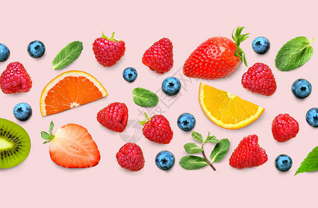 粉红色背景上各种成熟浆果的水果和浆果图案新鲜浆果和水果图片