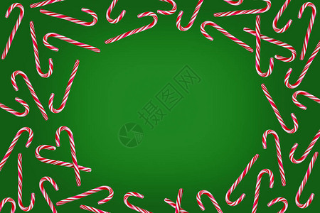 绿色圣诞节背景的红甘蔗和白甘蔗平坦图片