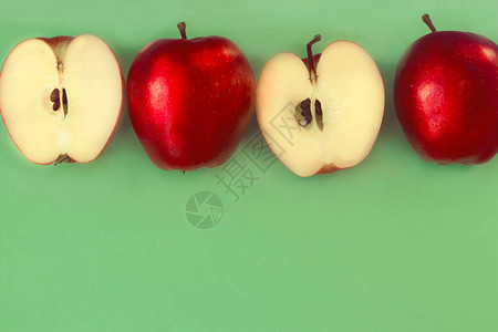绿色背景上红色苹果的条形红苹果图片