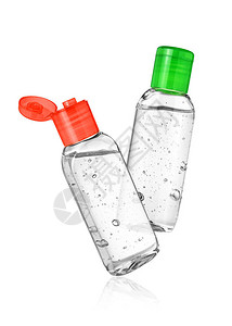 两瓶白色背景中分离的洗手液或消毒凝胶图片