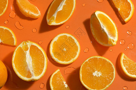 橙色背景的橙子柑橘水图片