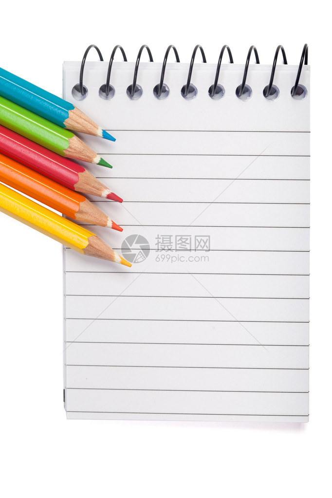 笔记本上有黄色橙色红色和蓝色等各种彩色铅图片