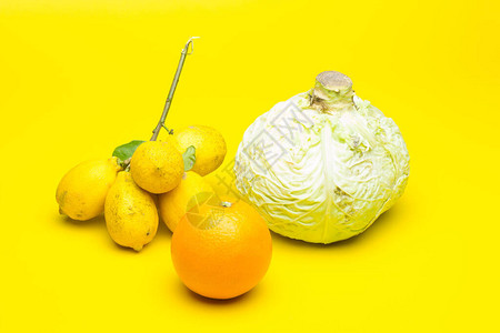 白菜绿橙和柠檬黄柑橘和蔬菜背景图片