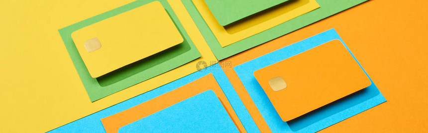 绿色橙色蓝色和黄色背景的空白信用图片