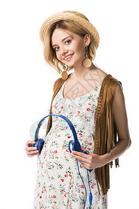 孕妇在腹部用耳机戴耳机图片