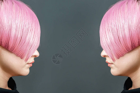 穿短粉红色头发的年轻女孩和两边都摆着漂亮的发图片