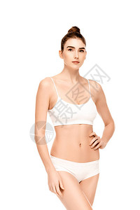 妇女穿着内裤顶上站着手站在白色背景图片