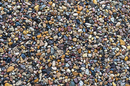 彩色碎石的背景精细的海卵石质地小的多色鹅卵石婴图片
