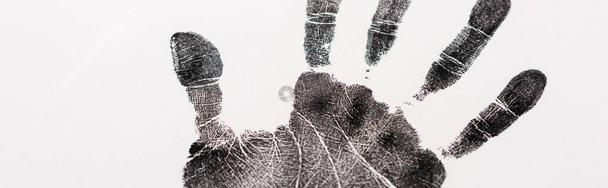 在白色人权概念上孤立的黑色手印被图片