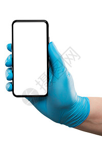 蓝手套男手持触摸屏幕智能手机图片