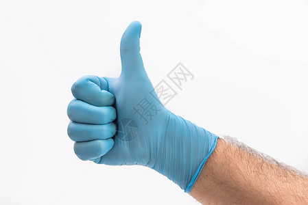 与医疗用蓝色乳胶防护手套并肩携带显示白底的拇指图片