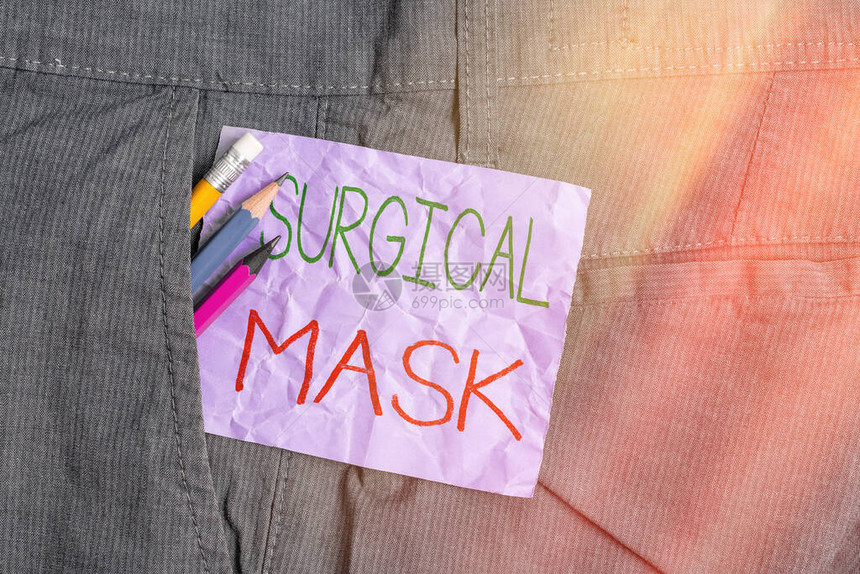 显示外科口罩的概念手写卫生专业人员在手术和护理期间所穿的概念意义书写设备和裤袋内图片