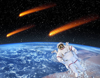 上面的地球和彗星宇航员正前方摆放着由美国航天局提图片