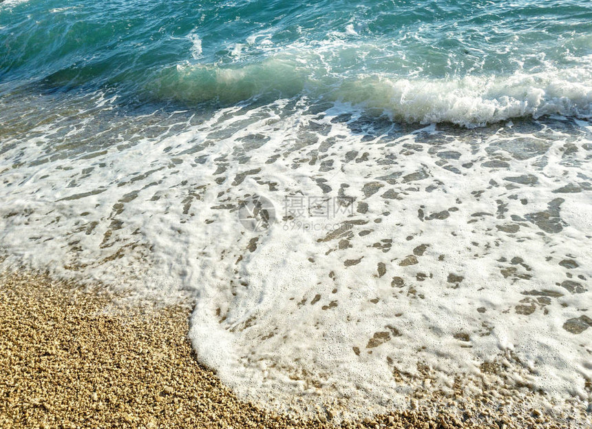 海洋景观绿松石海波浪美丽的海滨与沙质海岸可用于杂志网页横幅卡图片