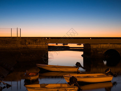 日落时法鲁码头的长时间曝光照片图片