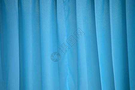 蓝色窗帘或帷幔背景图片