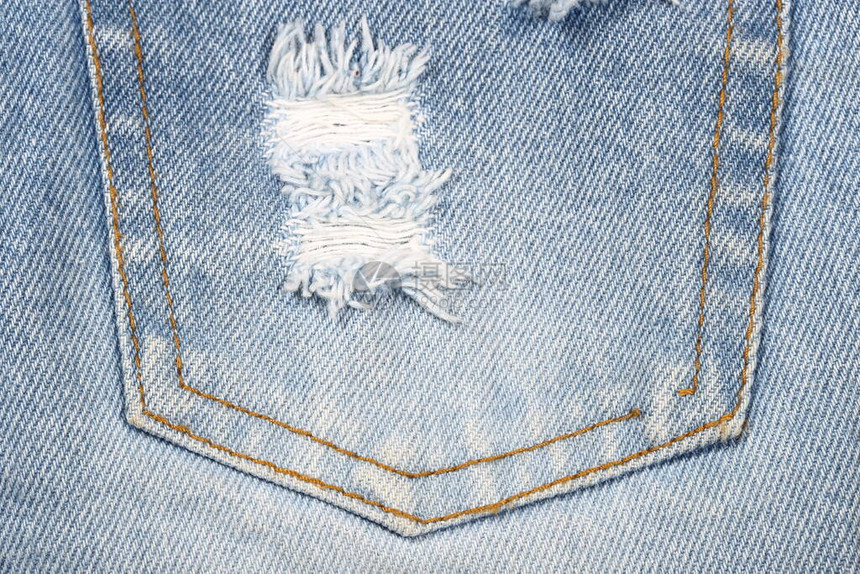 让织布的纹理背景蓝色短牛仔裤的一部分细编织的图片