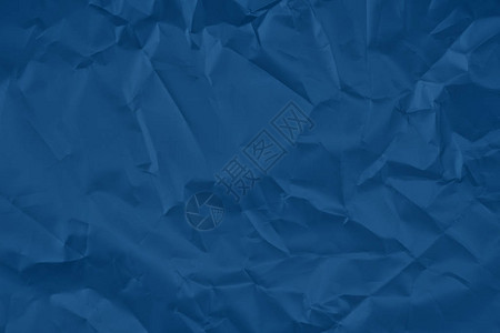时尚的蓝色纹理背景皱巴的缎纸质地平躺2020年背景图片