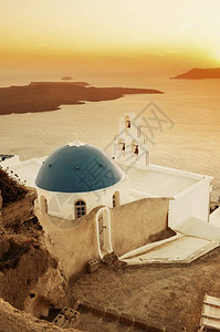 圣托里尼岛在希腊日落时图片