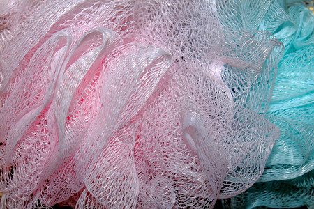 粉色和蓝色毛巾网状结构明亮和丰富的颜色背景图片