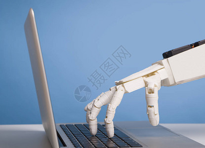 互联网机器人概念在笔记本电脑键盘上自动手打字图片