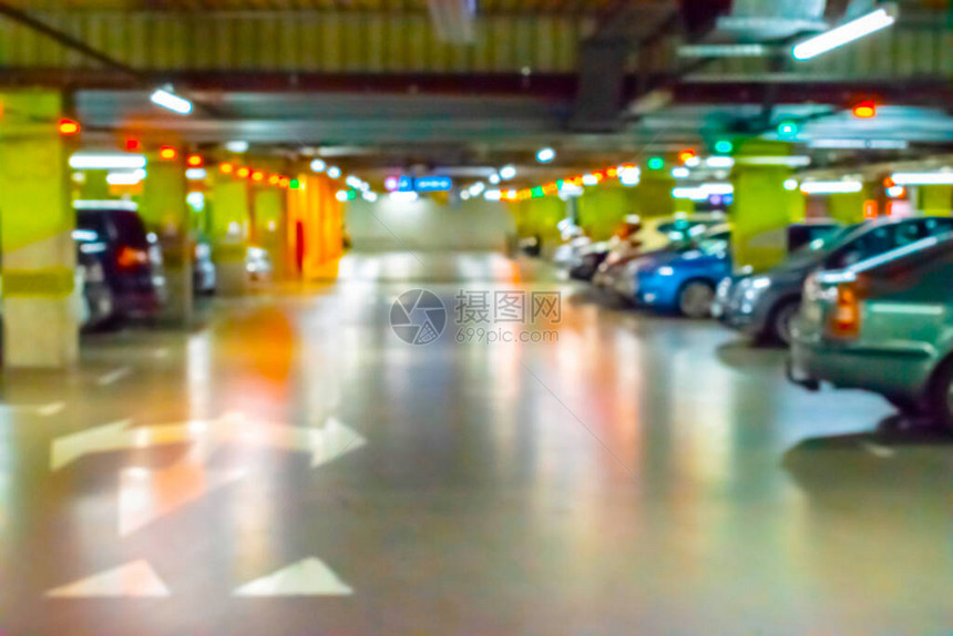 停车场模糊地下城车库的停车场停车位在软焦点的空路沥青背景工图片