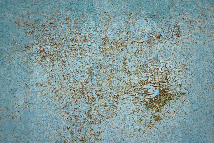绿松石漆金属表面上的棕色灰色和橙色锈迹被腐蚀的金属背景氧化金属质地图片