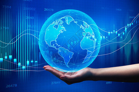 全球经济女手拿着世界地球仪在蓝色背景与经济金融图表和图表经济学图片