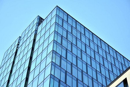蓝玻璃现代建筑摩天大楼的抽象纹理背景图片