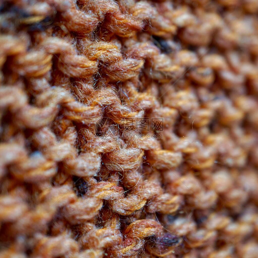 橙色羊毛抽象纺织背景图片