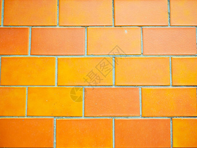 橙色墙壁瓷砖关闭纹理背景橙图片