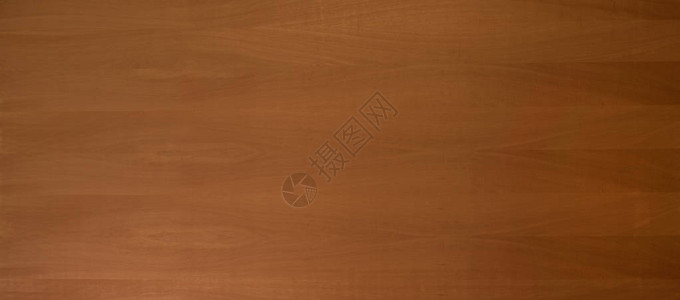 用于木工室内装饰或建筑材料的天然棕色木材的全景木板背图片