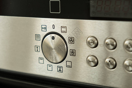 带按钮和旋钮的厨房烤箱不锈钢面板图片