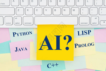 AI编程语言类型信息在键盘上粘贴的字条和一背景图片