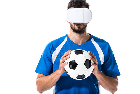 在虚拟现实耳机中的足球运动员图片