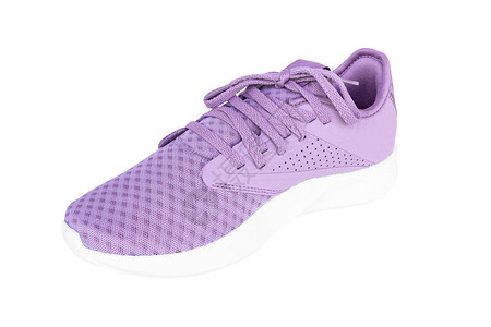 新的紫色运动鞋在白色图片