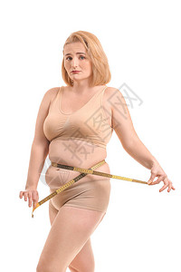 身穿白色背景的测量胶带的超重胖伤员妇女图片