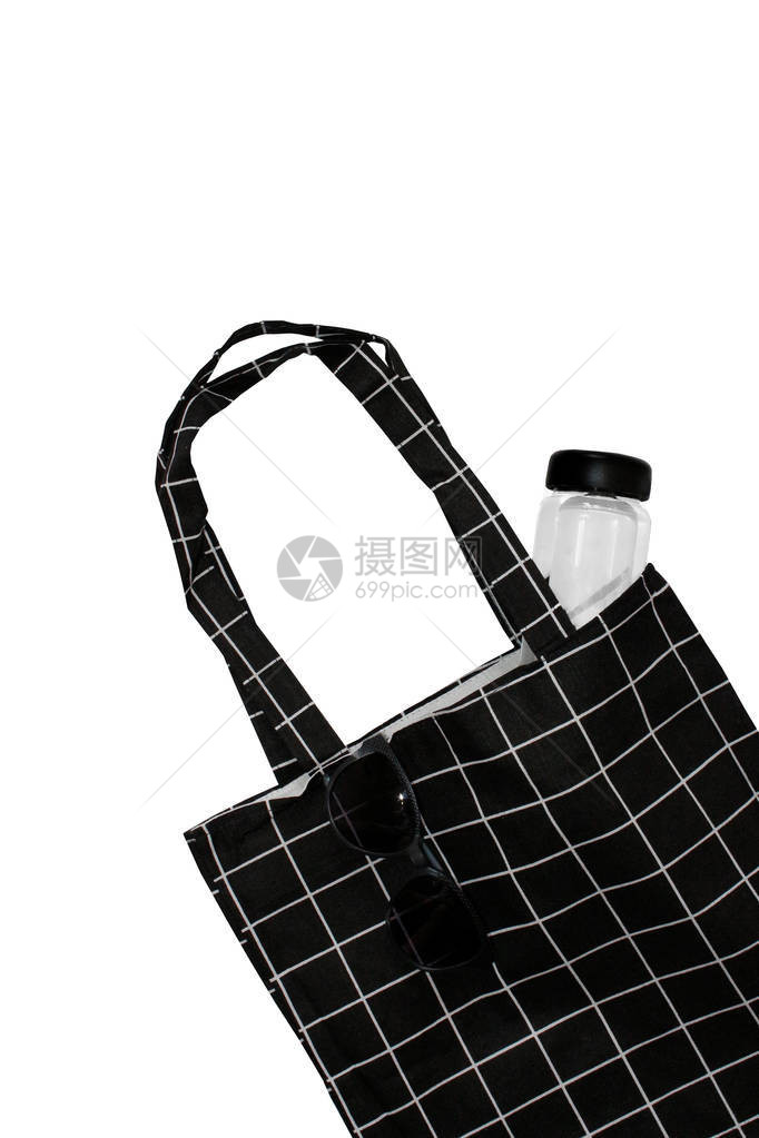 时尚购物袋黑色空白棉生态手提袋环境保护回收概念承运人回收杂货袋孤立在白色背景上的黑色棉袋图片