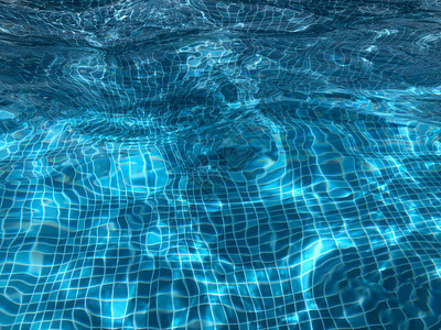 游泳池底部水下的阳光反射图片