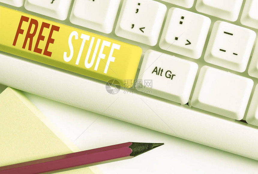 手写文字书写免费的东西概念照片您可以在商店中拥有的任何未付款的东西白色pc键盘图片