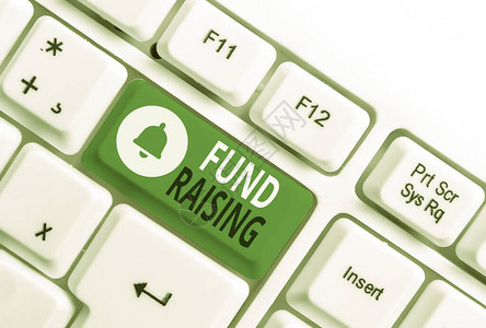 概念手写显示筹款概念意味着寻求为慈善白色pc键盘提供财务支持的行为图片
