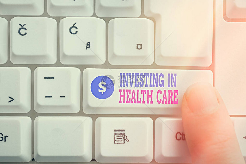 显示投资医疗保健的书面说明将钱用于维护或改进健康Pc键盘的商业概念图片