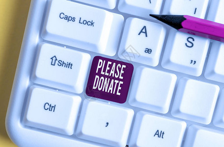 手写文字请捐赠概念供应家具分发捐赠款援助给慈善机构白色pc键盘图片