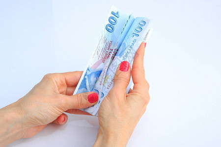 白色背景的土耳其纸币在女图片